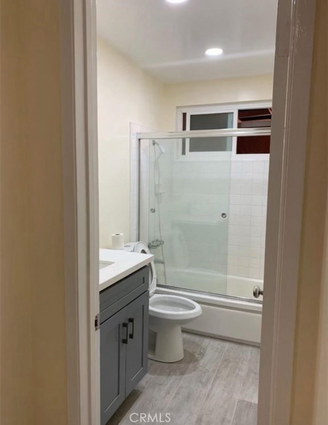 7363 Bothwell Road Reseda, CA 91335 - Photo 9 of 28 a bathroom with a granite countertop sink toilet and shower