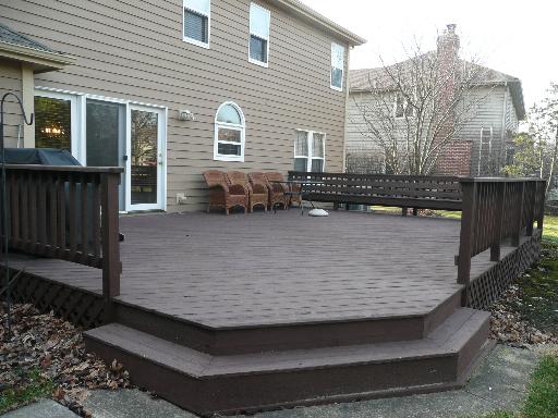 1227 Conan Doyle Road Naperville, IL 60564 - Photo 14 of 15 a view of a house with a yard chairs and wooden fence