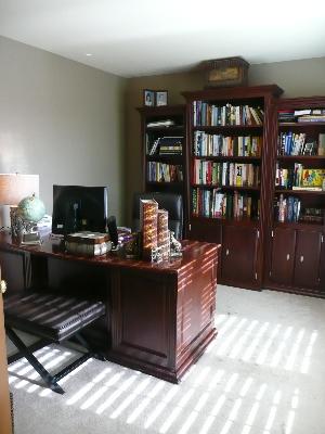 1227 Conan Doyle Road Naperville, IL 60564 - Photo 8 of 15 a living room with hard wood flooring and a couch