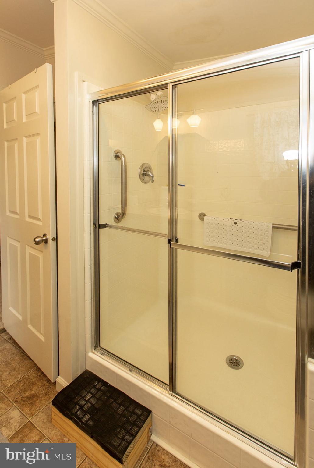 66 Random Road Douglassville, PA 19518 - Photo 16 of 27 a bathroom with a glass shower door
