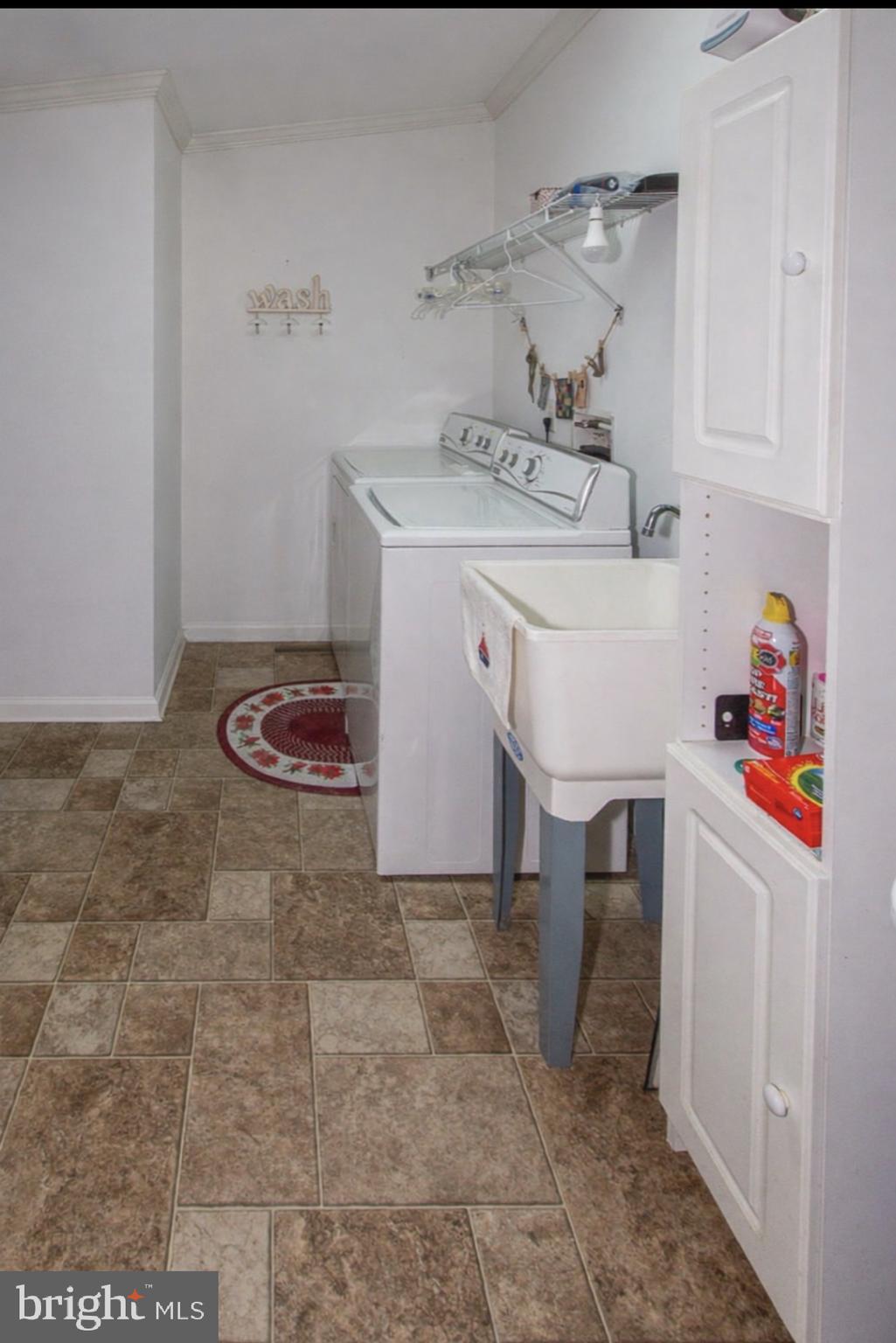 66 Random Road Douglassville, PA 19518 - Photo 19 of 27 a utility room with cabinets