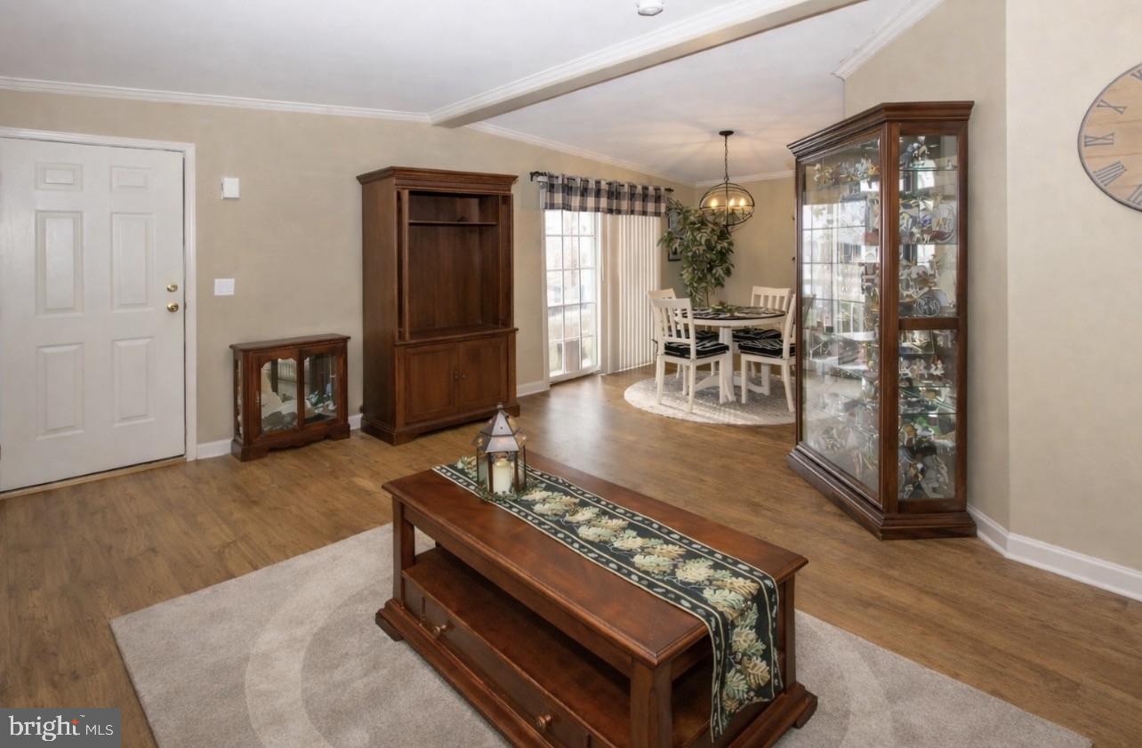 66 Random Road Douglassville, PA 19518 - Photo 3 of 27 a living room with furniture and wooden floor