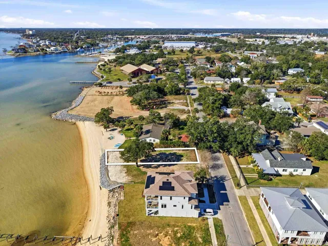 view of a lake with a building in the background