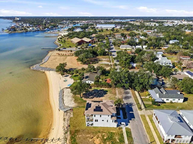 a view of a yard with palm trees