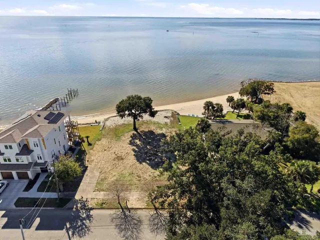 a view of a balcony with chairs