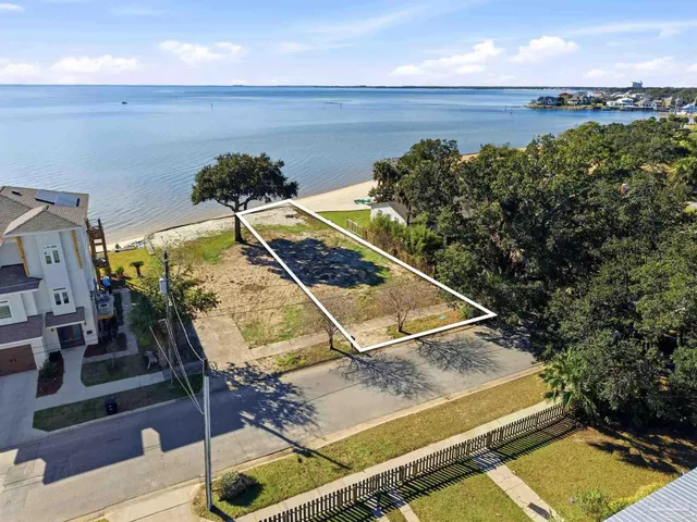 a view of a street with a houses