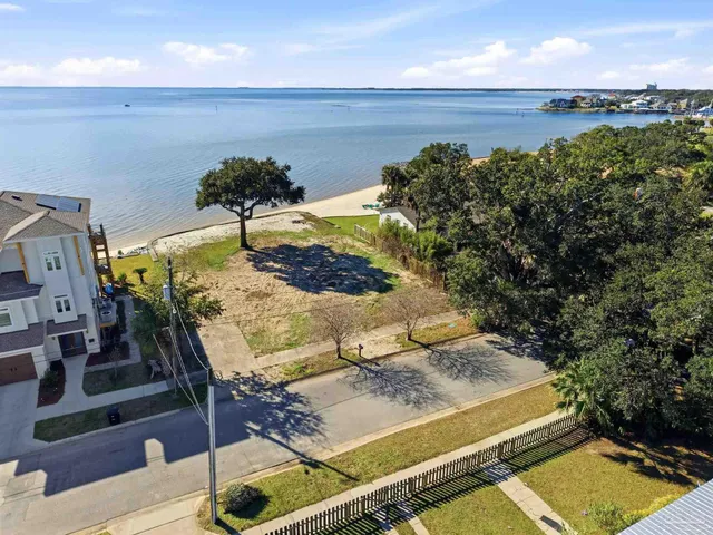 an aerial view of a house with a garden