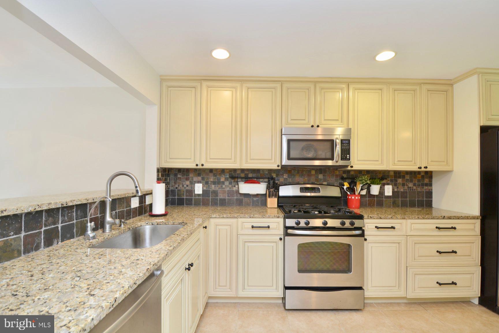 7701 Heming Place Springfield, VA 22151 - Photo 15 of 62 Granite counters with stainless appliances