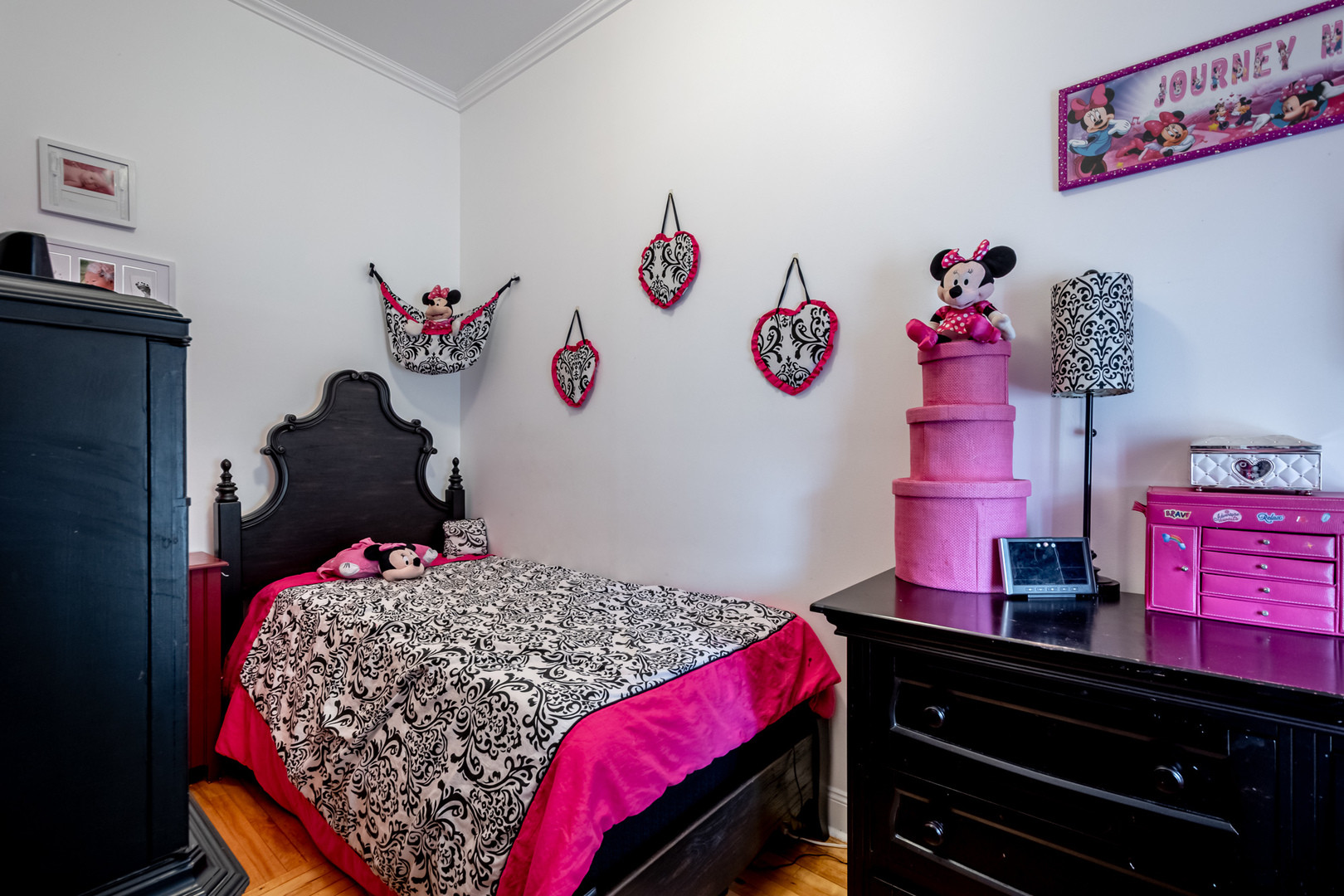 207 East Custer Street Lemont, IL 60439 - Photo 11 of 27 a bedroom with a bed and a dresser