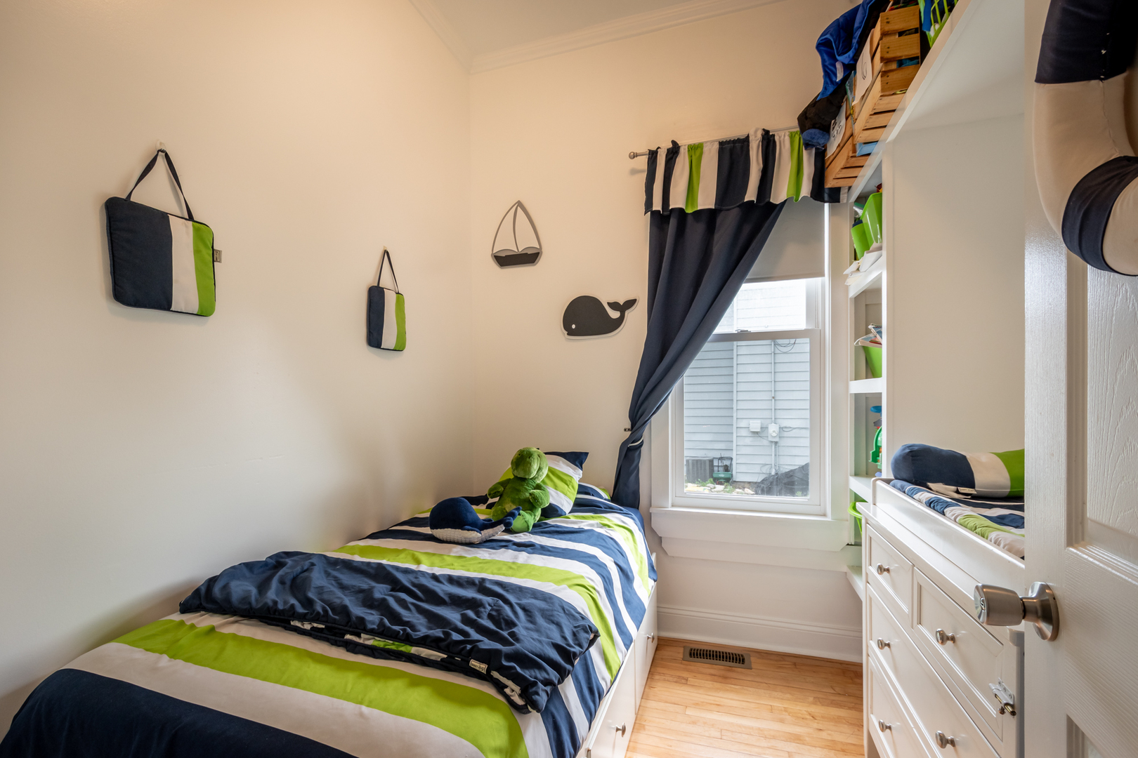 207 East Custer Street Lemont, IL 60439 - Photo 12 of 27 a bedroom with a bed and a window