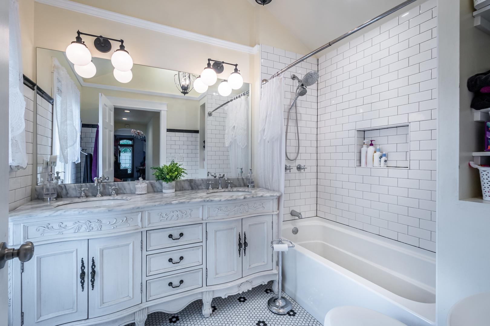 207 East Custer Street Lemont, IL 60439 - Photo 14 of 27 a bathroom with a granite countertop sink mirror and a bathtub