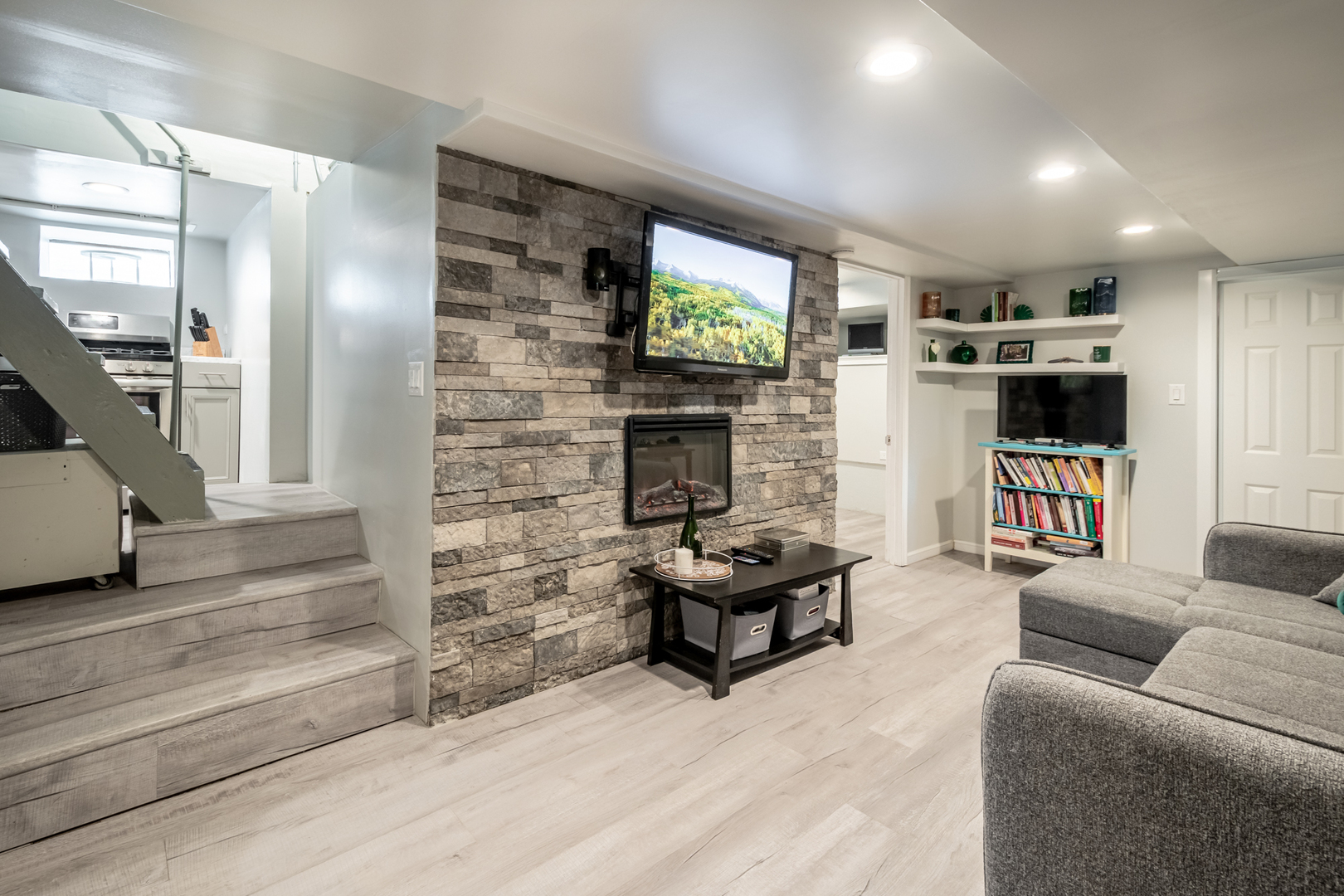 207 East Custer Street Lemont, IL 60439 - Photo 20 of 27 a living room with furniture and a flat screen tv