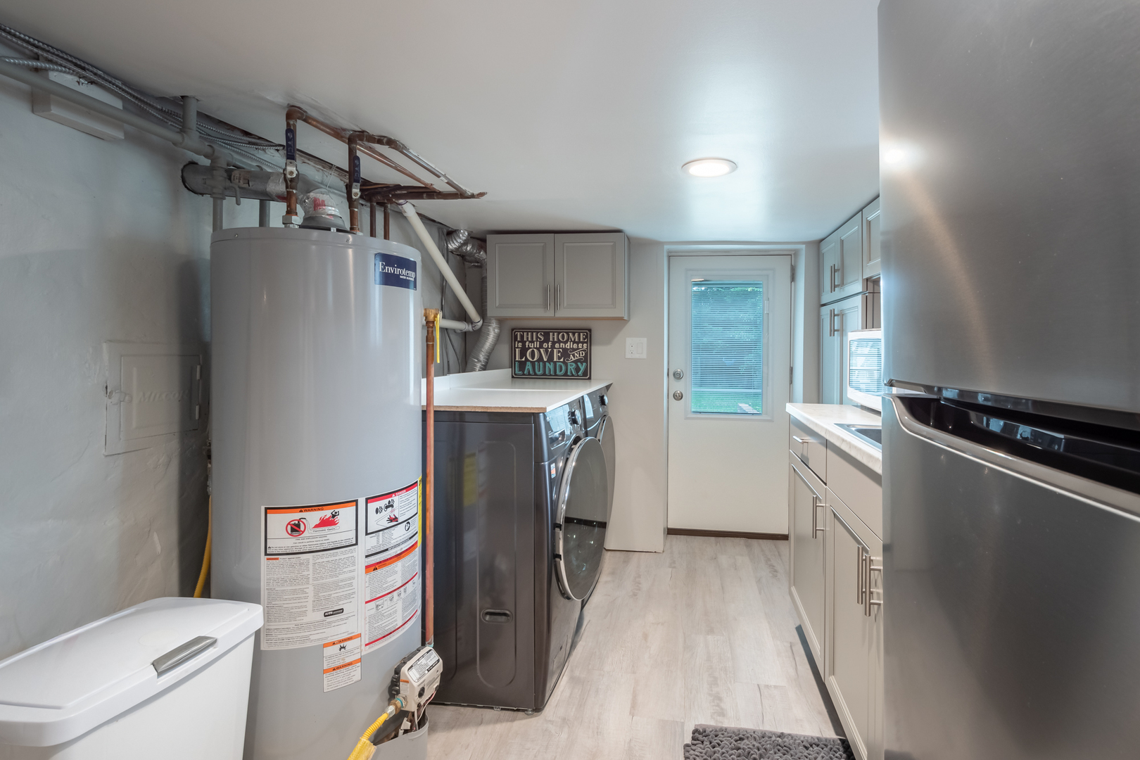 207 East Custer Street Lemont, IL 60439 - Photo 21 of 27 a storage room with washer and dryer