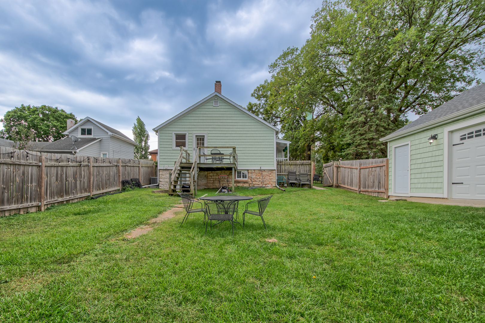 207 East Custer Street Lemont, IL 60439 - Photo 27 of 27 a view of a house with backyard and a sitting area