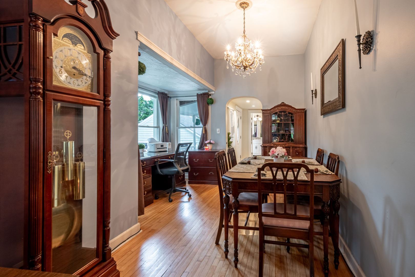 207 East Custer Street Lemont, IL 60439 - Photo 7 of 27 a view of a dining room with furniture and chandelier