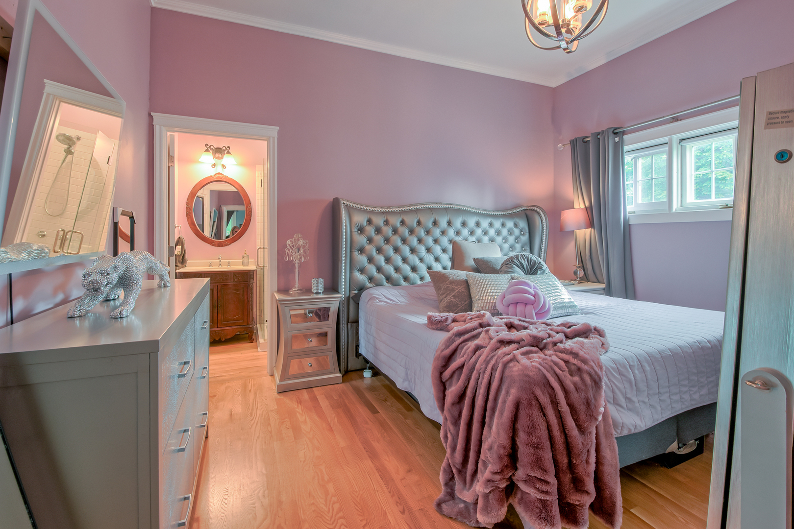 207 East Custer Street Lemont, IL 60439 - Photo 9 of 27 a bed room with a bed and a lamp