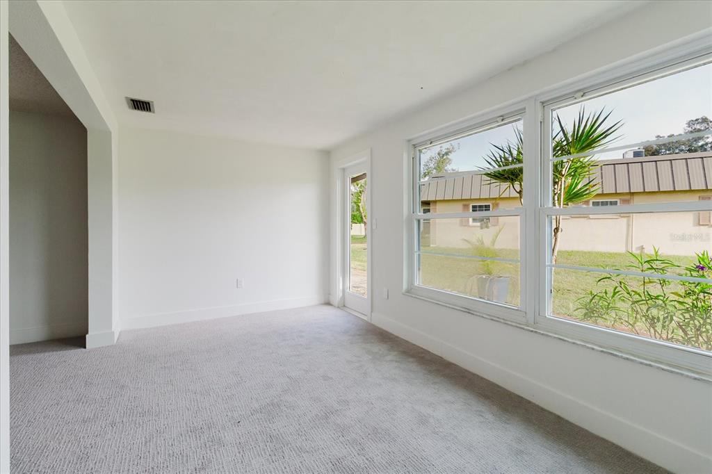 4235 Stratford Drive New Port Richey, FL 34652 - Photo 14 of 36 a view of an empty room and a window