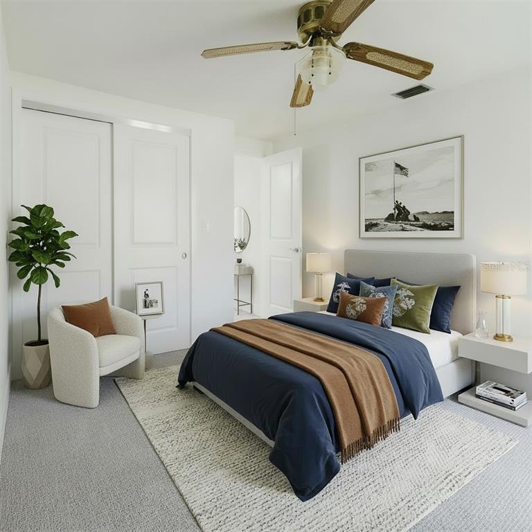 4235 Stratford Drive New Port Richey, FL 34652 - Photo 17 of 36 a bedroom with bed and window
