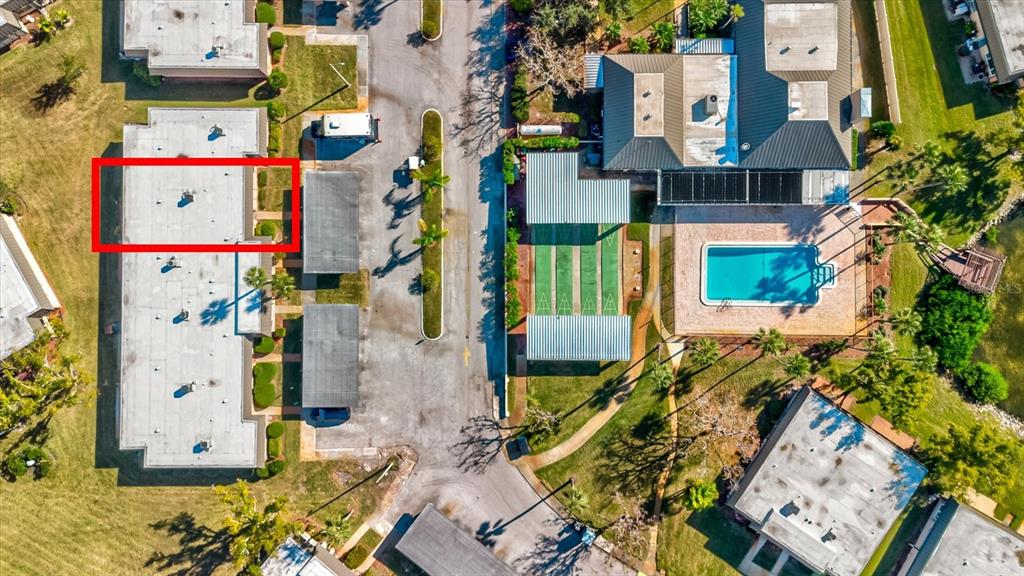 4235 Stratford Drive New Port Richey, FL 34652 - Photo 29 of 36 a bird view of multi story residential apartment building with yard
