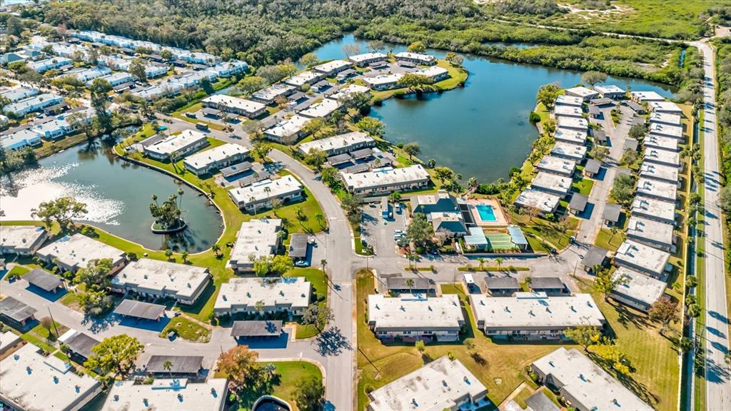 4235 Stratford Drive New Port Richey, FL 34652 - Photo 30 of 32 an aerial view of a city with floor to house