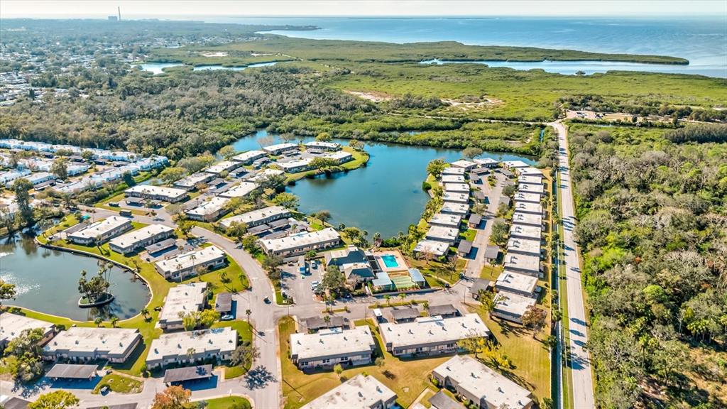4235 Stratford Drive New Port Richey, FL 34652 - Photo 32 of 32 an aerial view of ocean and residential houses with outdoor space