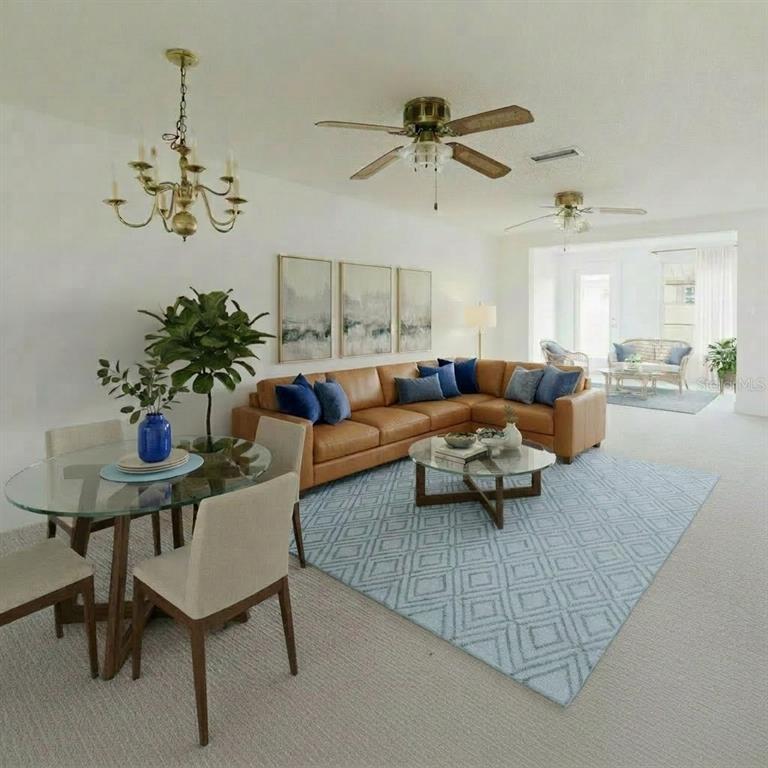 4235 Stratford Drive New Port Richey, FL 34652 - Photo 7 of 36 a living room with furniture