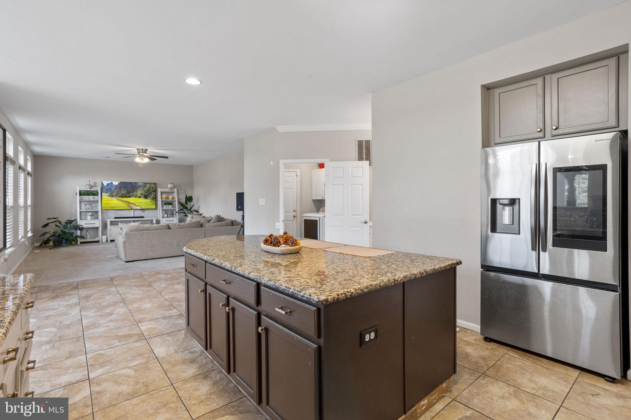 44 Red Fox Trail Sicklerville, NJ 08081 - Photo 20 of 49 a kitchen with stainless steel appliances granite countertop a sink stove and refrigerator