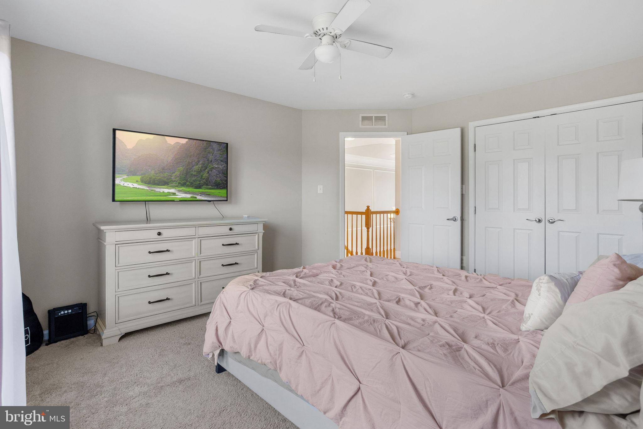 44 Red Fox Trail Sicklerville, NJ 08081 - Photo 36 of 49 a bedroom with a bed and a flat screen tv