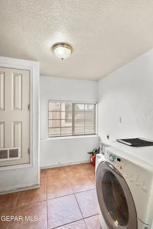 a view of utility room with washer and dryer
