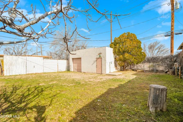 a view of a yard with an outdoor space
