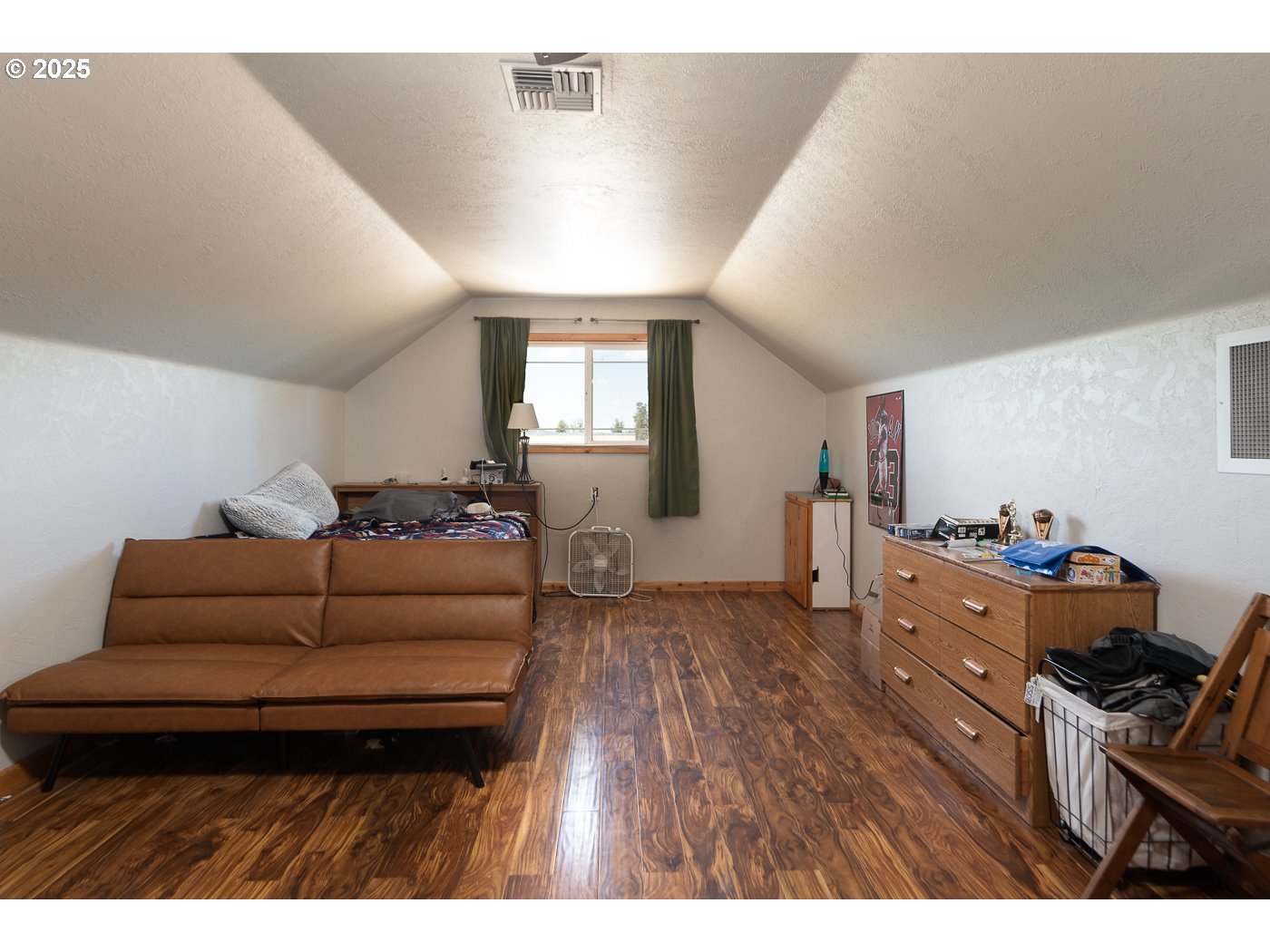 15990 Southwest Culver Highway Culver, OR 97734 - Photo 19 of 41 a living room with furniture and a wooden floor