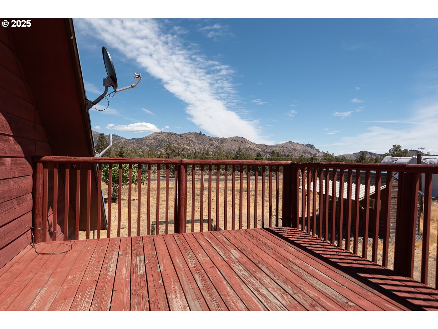 15990 Southwest Culver Highway Culver, OR 97734 - Photo 21 of 41 a view of balcony with wooden floor and fence