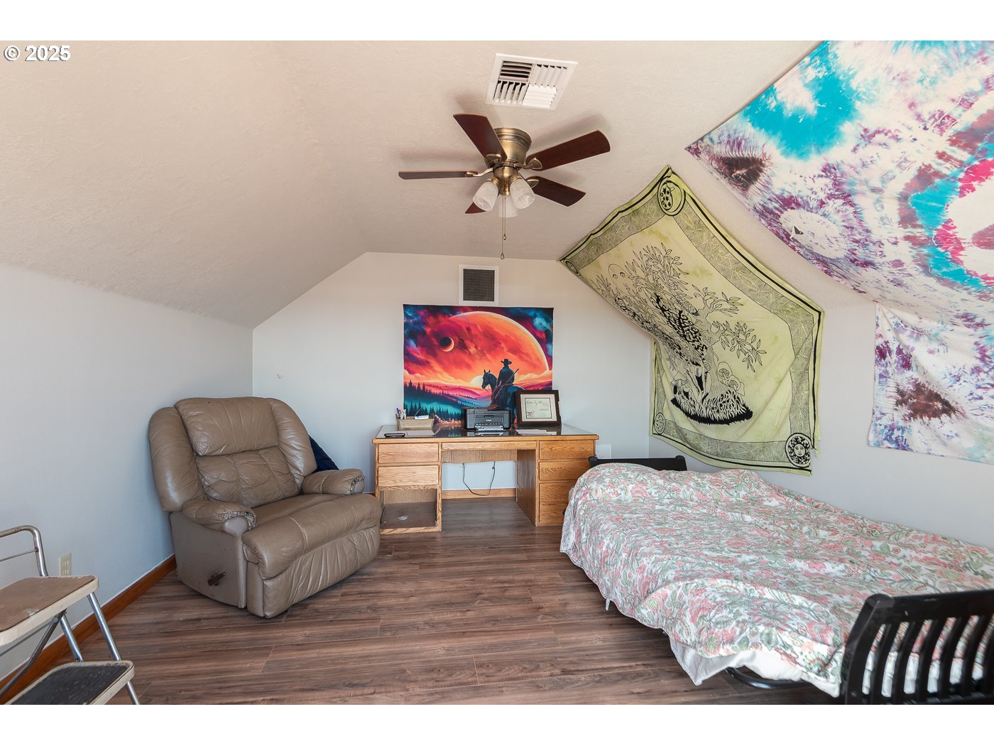 15990 Southwest Culver Highway Culver, OR 97734 - Photo 22 of 41 a bedroom with a bed and furniture