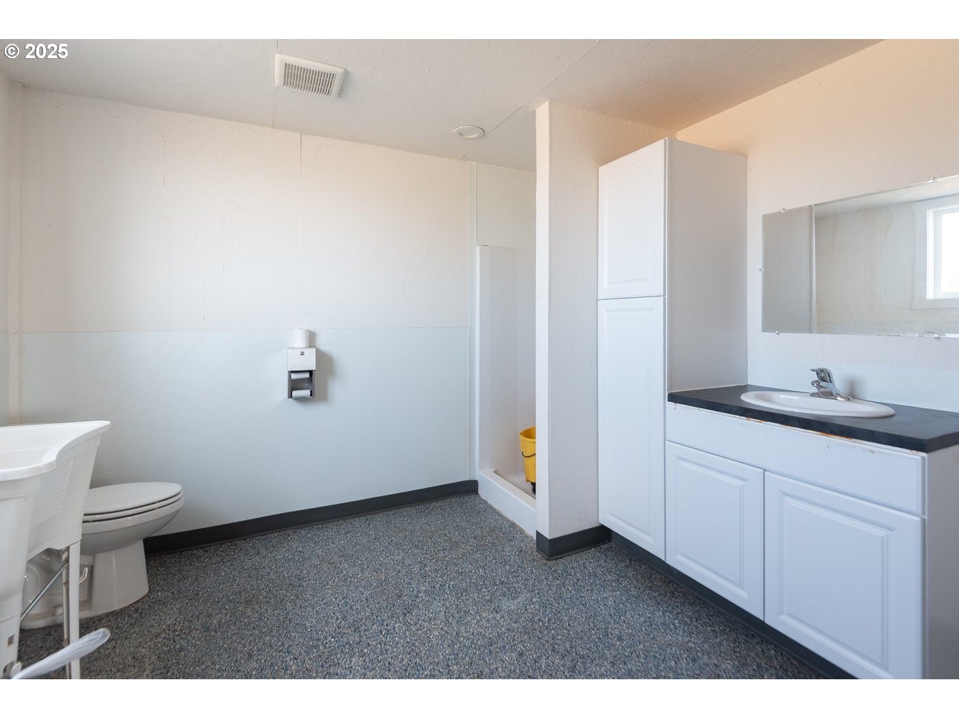 15990 Southwest Culver Highway Culver, OR 97734 - Photo 28 of 41 a bathroom with a sink and a toilet
