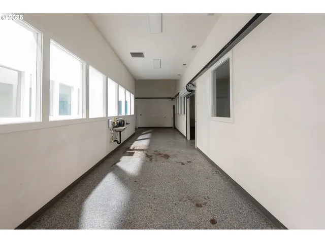 a view of a big room with wooden floor