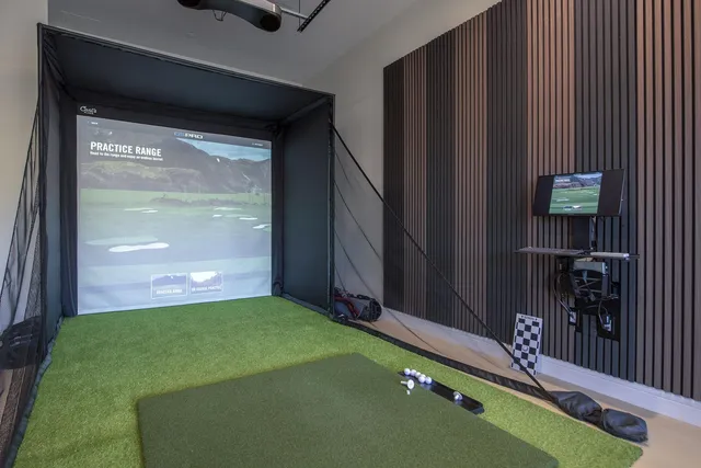 a room with furniture and air hockey table