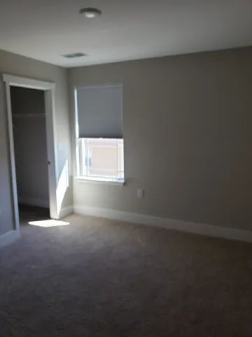 a view of a window in an empty room