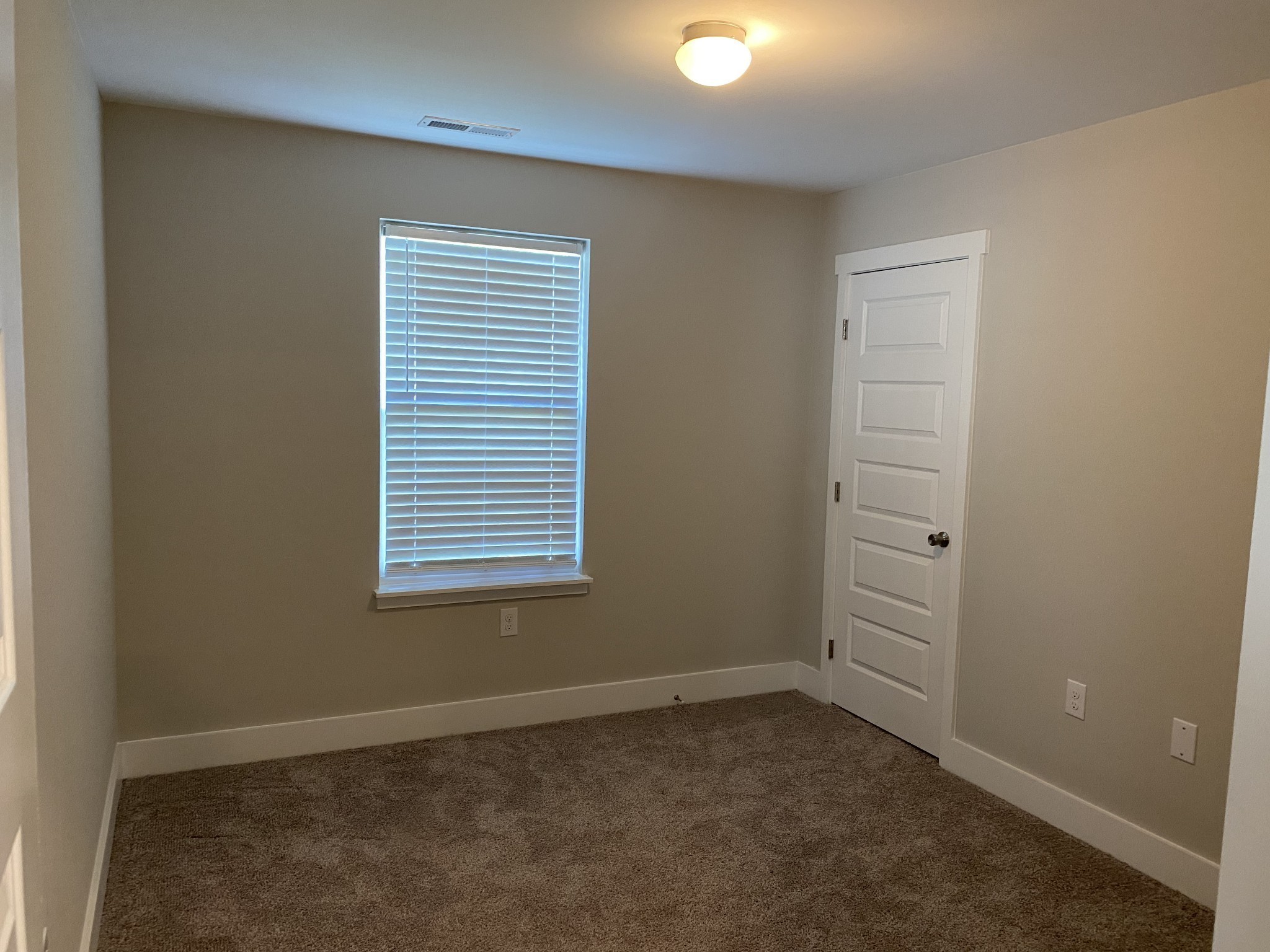 7002 Magnolia Crossings Spring Hill, TN 37174 - Photo 4 of 15 an empty room with windows