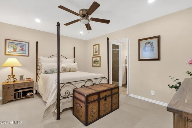 a kitchen with kitchen island granite countertop a sink and cabinets
