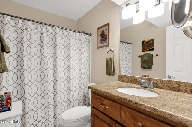 a view of a workspace with furniture