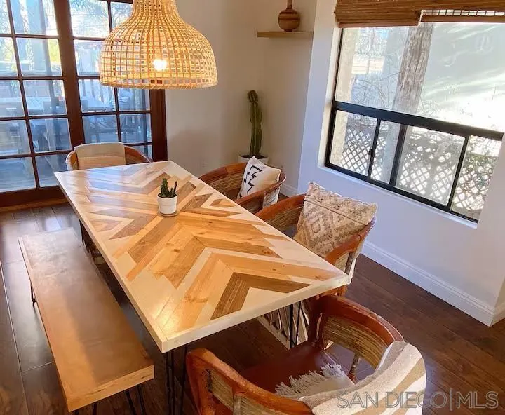 837 4th Street Encinitas, CA 92024 - Photo 13 of 41 a view of a dining room with furniture and a window