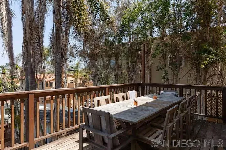 837 4th Street Encinitas, CA 92024 - Photo 34 of 41 a view of a dinning table and chairs on the roof deck