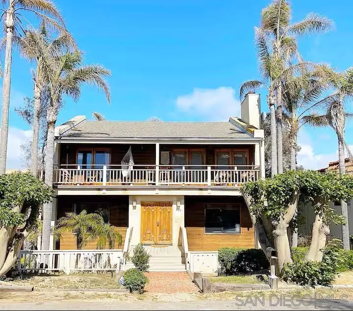 837 4th Street Encinitas, CA 92024 - Photo 4 of 41 a front view of a house with a yard