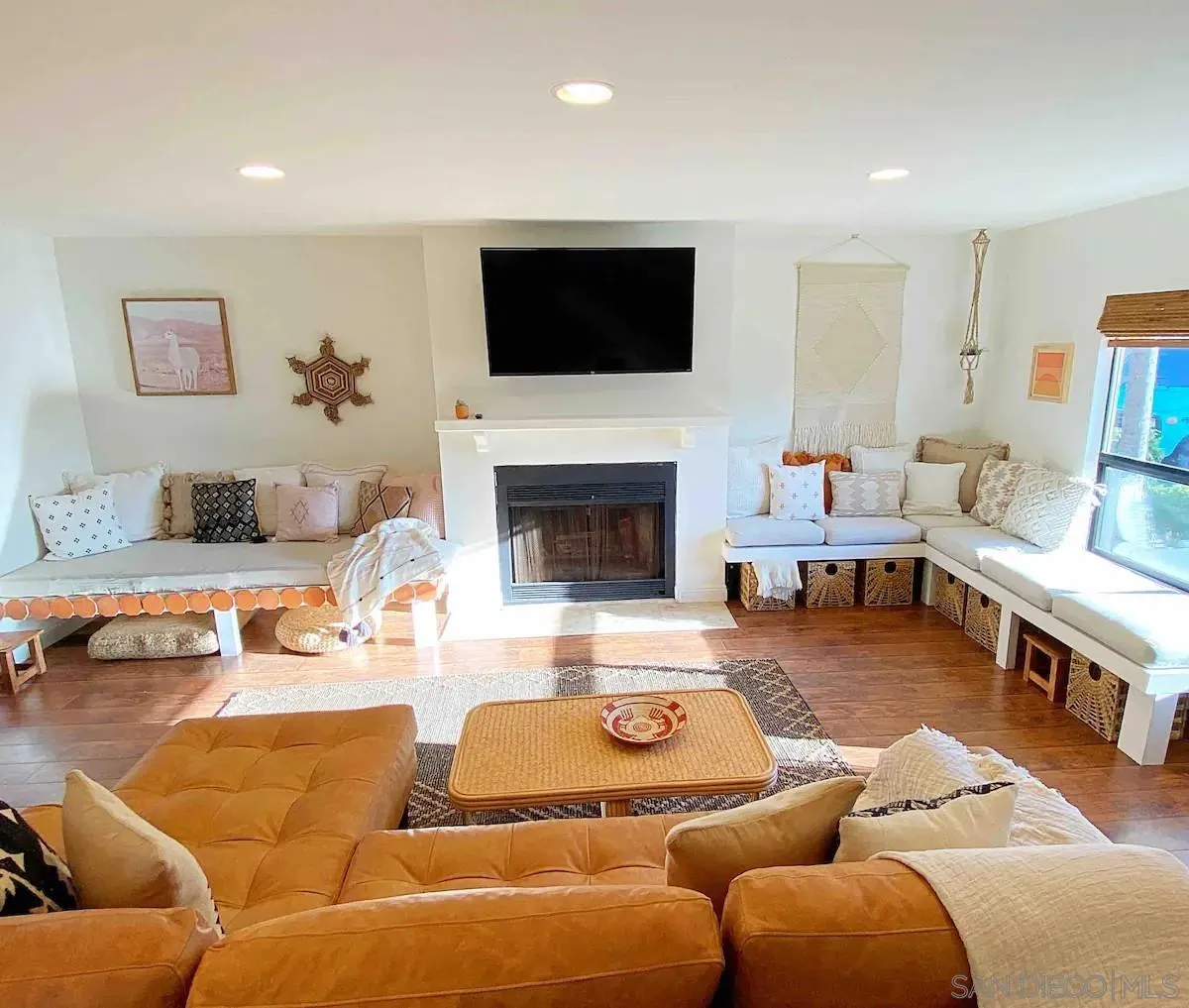 837 4th Street Encinitas, CA 92024 - Photo 10 of 41 a living room with furniture and a flat screen tv