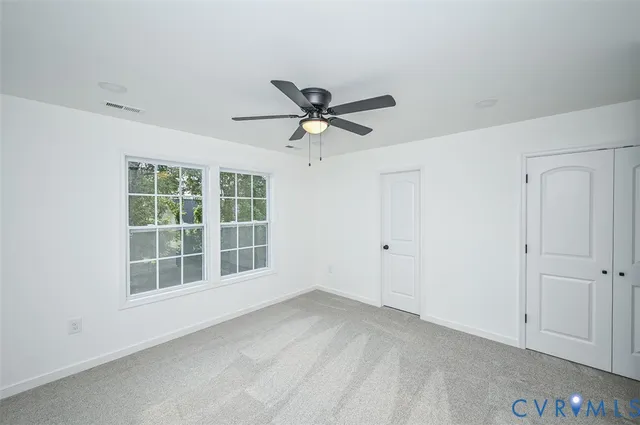 a view of an empty room with window