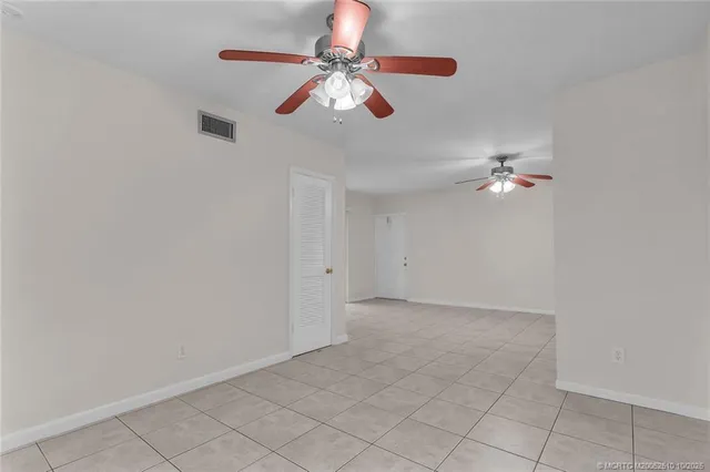 a kitchen with a stove top oven sink and cabinets