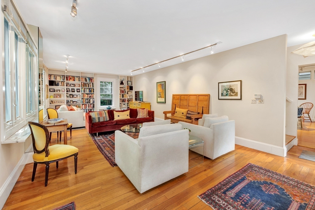 11 Maynard Place Cambridge, MA 02138 - Photo 4 of 26 a living room with furniture and wooden floor
