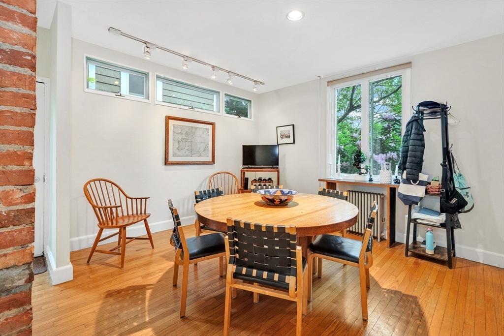 11 Maynard Place Cambridge, MA 02138 - Photo 9 of 26 a view of a dining room with furniture window and outside view