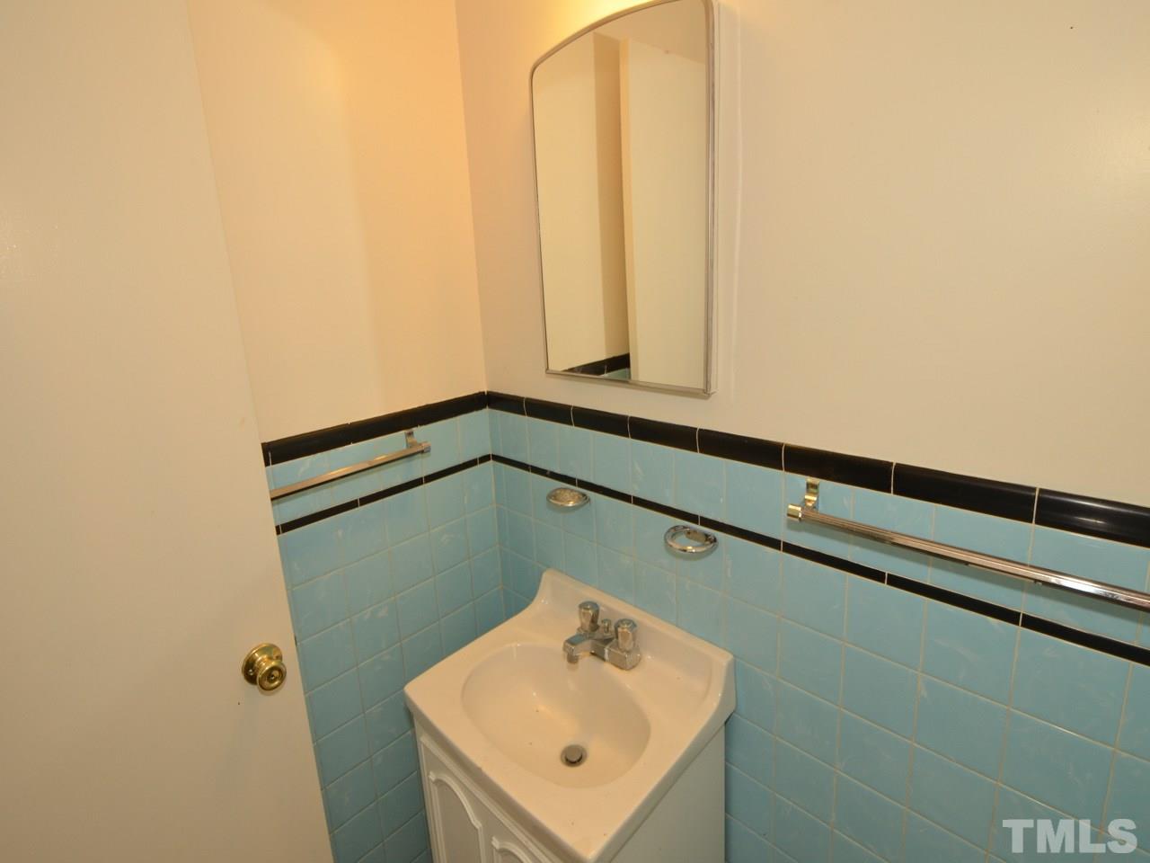 3508 Baugh Street Raleigh, NC 27604 - Photo 13 of 23 1/2 Bath located in bedroom.