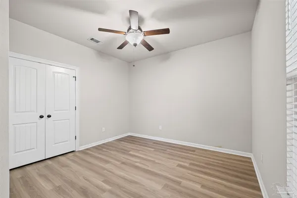 a spacious bathroom with a double vanity sink mirror and